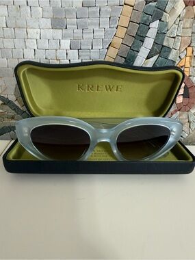 KREWE Translucent Light Blue Cat Eye Sunglasses with Brown Gradient Lenses